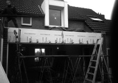 Plaatsen van staalbalk in achtergevel